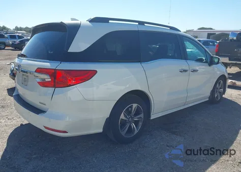 2018 Honda Odyssey Touring from USA, damaged, VIN 5FNRL6H84JB027099